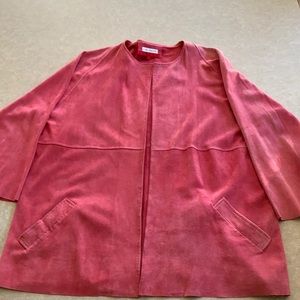 Bergdorf Goodman woman’s pink suede jacket